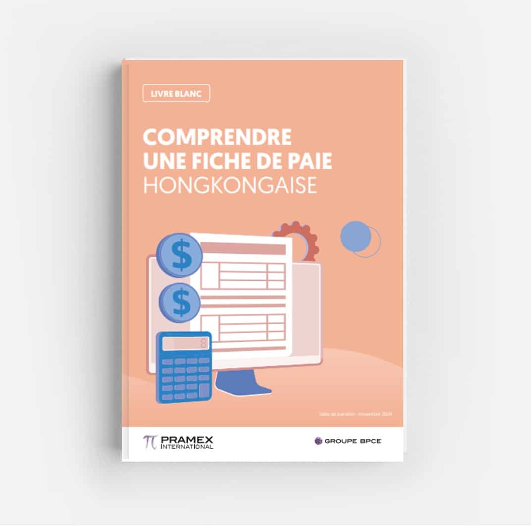 l'écran d'un ordinateur, une calculatrice et deux pieces de monnaie pour représenter le thème de la fiche de paie à Hong Kong