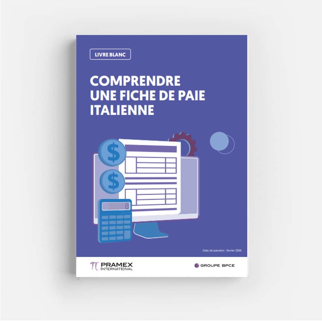 l'écran d'un ordinateur, une calculatrice et deux pieces de monnaie pour représenter le thème de la fiche de paie en Italie