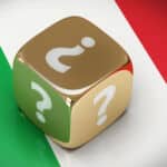 Un drapeau italien avec un dé faisant apparaitre des points d'interrogation, pour symboliser les points d'étonnement lors de la création d'une SRL en Italie.