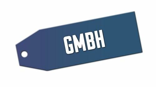 une étiquette avec le mot "GmbH". pour représenter le thème de créer une GmbH en Allemagne.