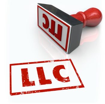 Un tampon avec les mots "LLC", pour représenter la création d'une LLC à Hong Kong