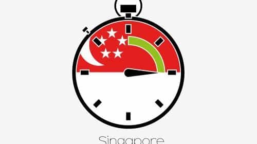 Un chronomètre avec le drapeau de Singapour, pour symobilser les délais pour créer son entreprise à Singapour